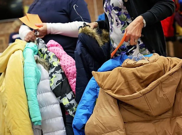 Just before freezing KC temps, coat drives keep neighbors warm